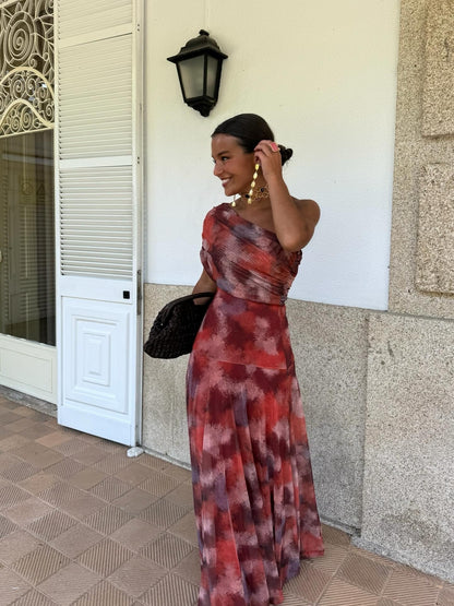 Dames maxi jurk met one-shoulder ontwerp en print schuin van voren