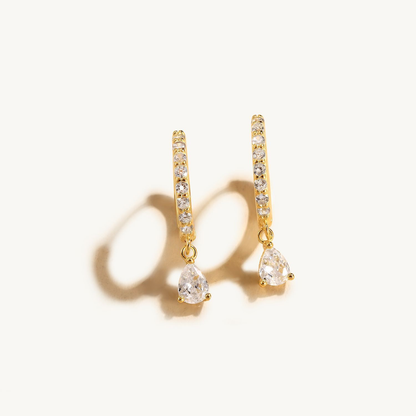 Sterling zilveren oorbellen set met kleine hoops en elegante hangers