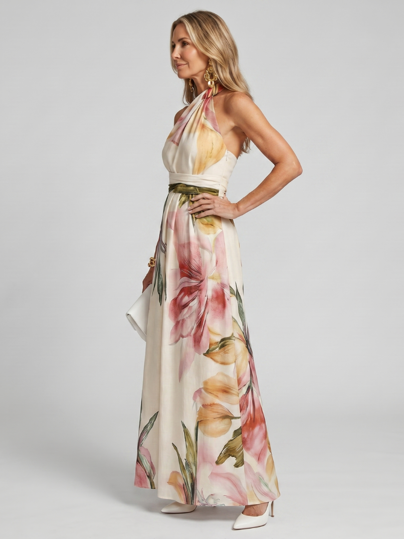 Lange damesjurk met halterhals en bloemenprint