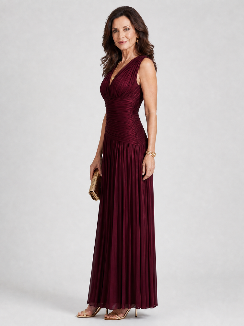 Mouwloze bordeaux jurk met geplooide midi-rok