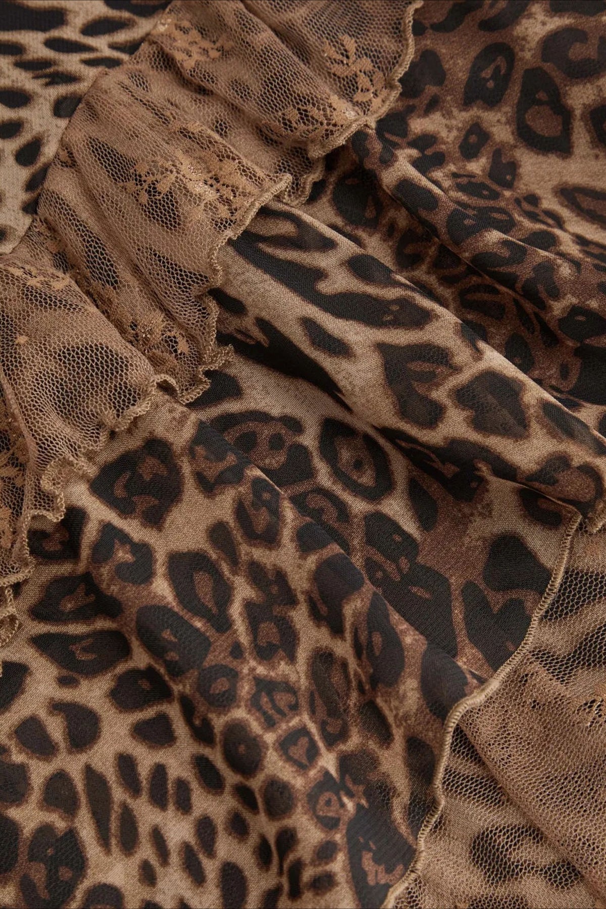 Dames midi-jurk met kant, luipaardprint en stijlvolle uitstraling
