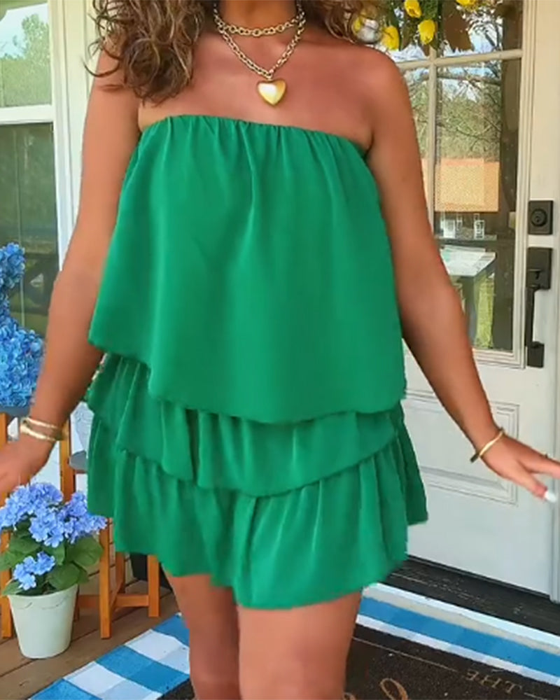 Detailfoto van de stof en pasvorm van de strapless romper