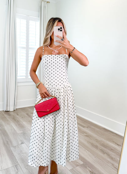 Dames zomerjurk met polkadots, midi lengte en luchtige pasvorm