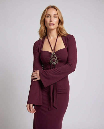 Lange damesjurk met strapless bovenkant en zwierige zoom