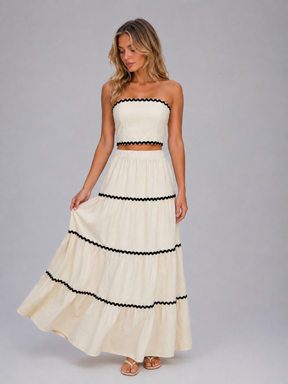 Dames co-ord set met maxirok en crop top gedragen als complete look
