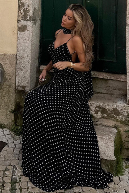 Zwarte polkadot maxi jurk met V-hals en open achterkant