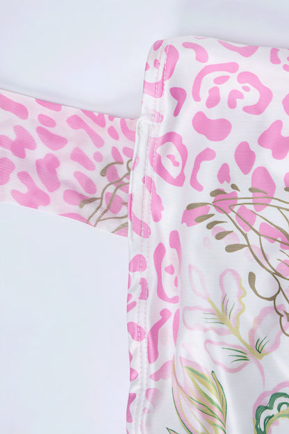 Set met haltercrop top met bloemenprint en aansluitende minirok roze