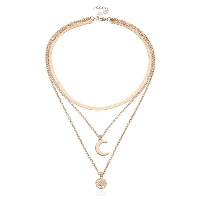Damesketting met twee lagen en symbolische hangers