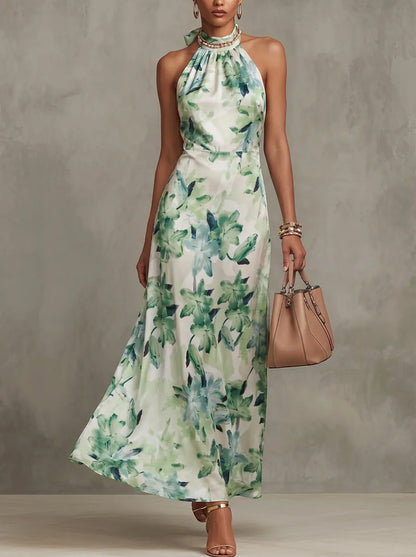 Dames maxi jurk met bloemenprint en halterhals, voorkant in beeld