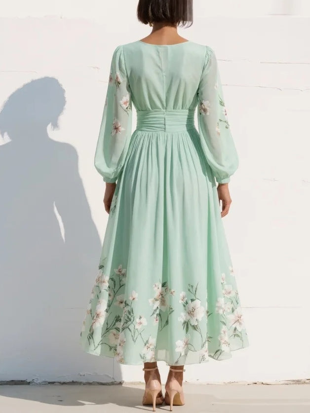 Groene midi jurk met bloemenprint en fluttermouwen in volledige lengte
