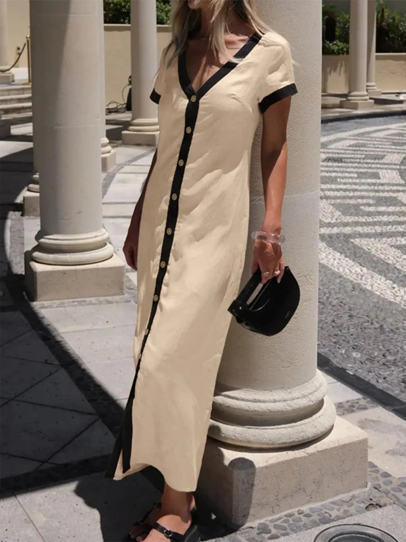 Midi-jurk met knopen en contrastbies