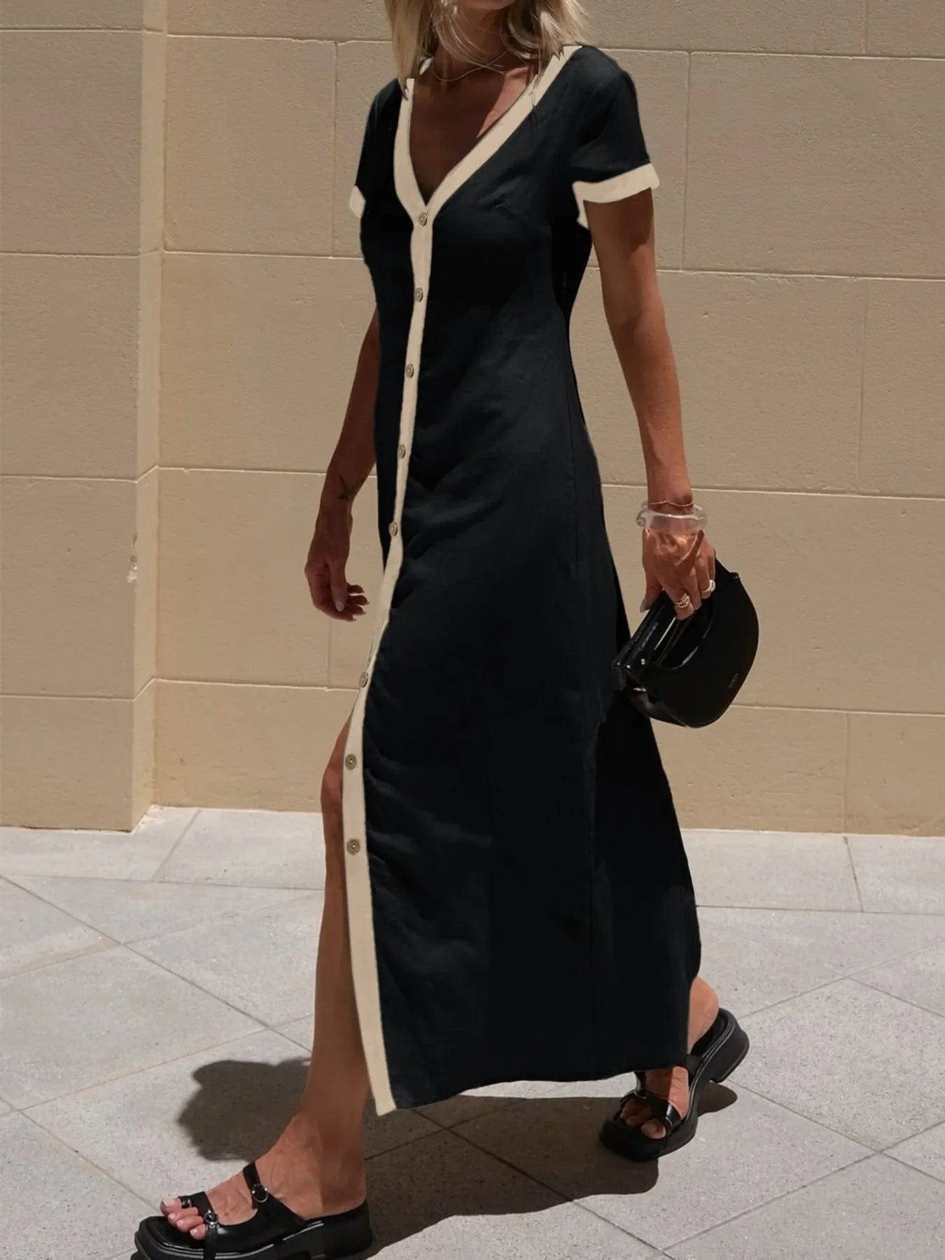 Midi-jurk met knopen en contrastbies