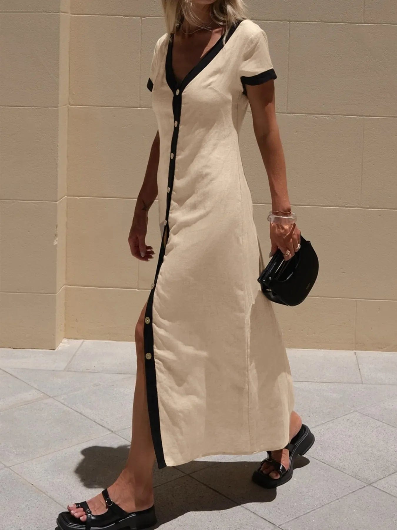 Midi-jurk met knopen en contrastbies