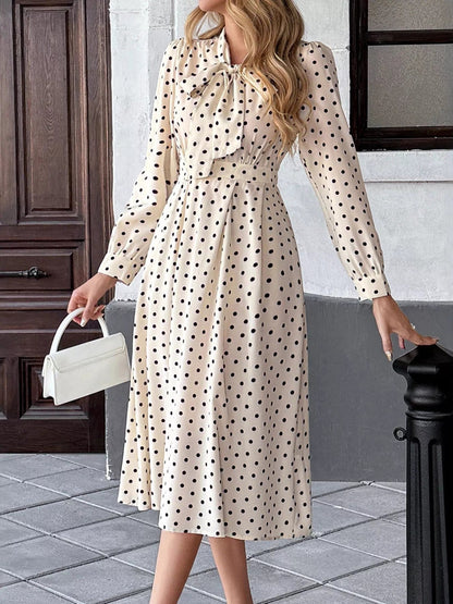 Witte midi-jurk met polkadot en knoopsluiting van katoenmix