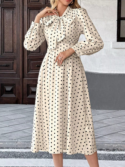 Witte midi-jurk met polkadot en knoopsluiting van katoenmix