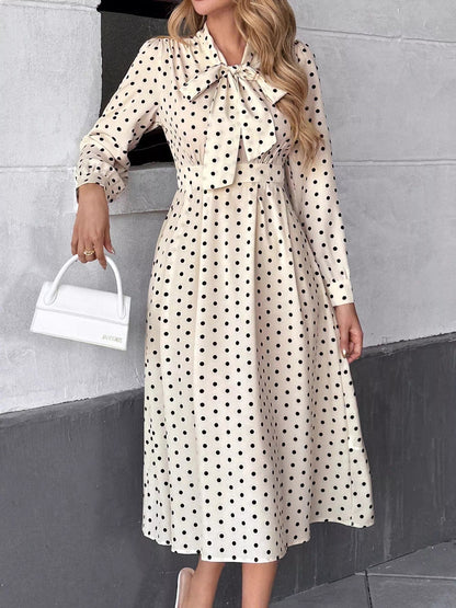 Witte midi-jurk met polkadot en knoopsluiting van katoenmix