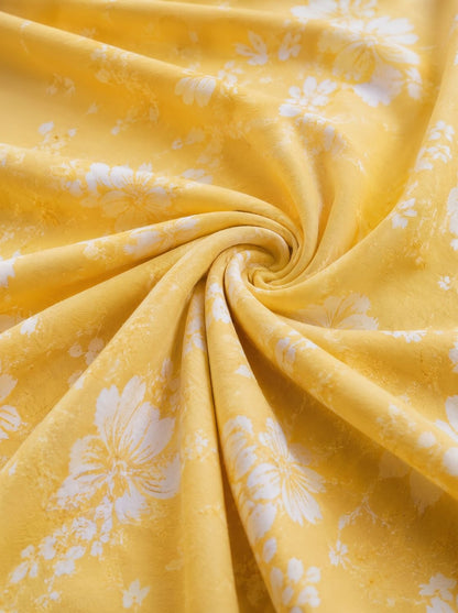 Bohemian jurk met smockdetail en ruches langs de rand