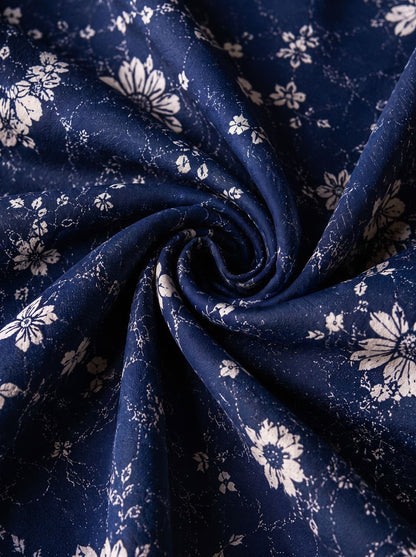 Elegante bloemenjurk in maxi-lengte met hoge split